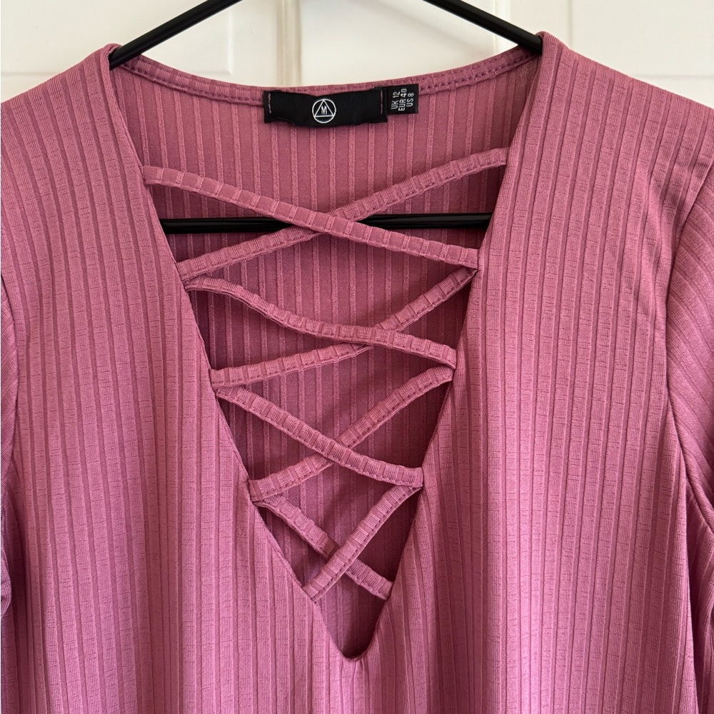 Dusty pink, midi, stretchy dress with deep v-neck criss cross front. Never worn.